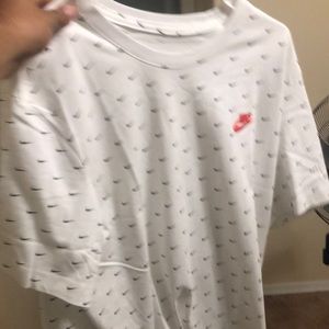 White Nike shirt